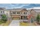 Charming two-story home with a well-manicured lawn and inviting front porch at 3522 Harvard Pl, Broomfield, CO 80023