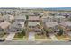 A sunny day captures a neighborhood with well-maintained homes and green spaces, perfect for Gathering living at 3522 Harvard Pl, Broomfield, CO 80023