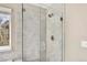The shower has a glass enclosure and a rain style shower head at 3522 Harvard Pl, Broomfield, CO 80023