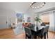 Inviting living room with a bay window, hardwood floors, and modern decor at 1544 E Weldona Way, Superior, CO 80027
