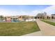 A charming school building with playground and colorful play equipment at 1544 E Weldona Way, Superior, CO 80027