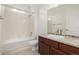 A cozy bathroom with a shower over the tub and a modern vanity at 11972 W Long Cir # 204, Littleton, CO 80127