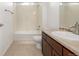 Bathroom features a bathtub with shower and a modern vanity at 11972 W Long Cir # 204, Littleton, CO 80127