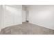 Bedroom with closet and neutral carpet at 11972 W Long Cir # 204, Littleton, CO 80127