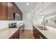 Spacious open-concept kitchen includes stainless appliances at 11972 W Long Cir # 204, Littleton, CO 80127