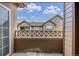 This patio offers a peaceful outdoor space and a pleasant view of the surrounding building exteriors and sky at 11972 W Long Cir # 204, Littleton, CO 80127