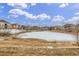 Enjoy beautiful community views of the frozen pond and surrounding landscaped grounds at 11972 W Long Cir # 204, Littleton, CO 80127