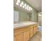 Bathroom with double sinks, ample counter space and a full shower and tub at 12793 Leyden St # D, Thornton, CO 80602