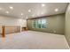 Spacious bonus room filled with natural light, features built-in desk and neutral carpeting at 12793 Leyden St # D, Thornton, CO 80602