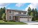 Two-story home with stone and siding, attached two-car garage, and well-manicured lawn at 5628 Riverbend Ave, Firestone, CO 80504