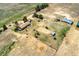 Sprawling property featuring multiple outbuildings, pastureland, and living quarters at 4295 S County Road 193, Byers, CO 80103