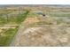 Aerial view of vast acreage offering boundless possibilities for rural living at 4295 S County Road 193, Byers, CO 80103