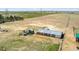 Aerial view of barns featuring a vast yard at 4295 S County Road 193, Byers, CO 80103