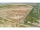 Aerial view of vast acreage offering boundless possibilities for rural living at 4295 S County Road 193, Byers, CO 80103
