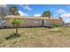 This lovely home features a spacious backyard, perfect for outdoor activities and entertainment at 4295 S County Road 193, Byers, CO 80103