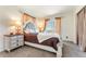 This stylish bedroom has large windows that overlook a beautiful view at 4295 S County Road 193, Byers, CO 80103
