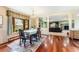 Formal dining room featuring hardwood floors, chandelier, and bay window at 4295 S County Road 193, Byers, CO 80103