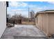 The home has a backyard outbuilding and stamped concrete patio at 12215 Viewpoint Dr, Lakewood, CO 80401