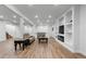 Large finished basement features recessed lighting, fireplace, and wood-look flooring for a warm feel at 12215 Viewpoint Dr, Lakewood, CO 80401