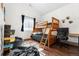 Bedroom featuring a bunk bed and desk with a natural light from a window at 445 Beaver Rd # 4, Idaho Springs, CO 80452