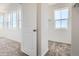 Bedroom featuring plush carpet, neutral walls, large windows and closet with ample space for clothing at 6562 Arbor Blvd # 1, Thornton, CO 80602