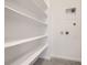 Bright pantry with clean white shelving offers ample storage for an organized home at 6562 Arbor Blvd # 1, Thornton, CO 80602