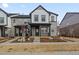 Charming two-story home with stone accents and a covered front porch at 741 N Tibet St, Aurora, CO 80018