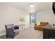 Comfortable living room featuring a sofa and a desk space at 208 Dorothy Dr, Berthoud, CO 80513