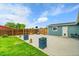 Great backyard featuring a well-maintained lawn and concrete patio perfect for relaxing or entertaining at 243 Cherokee Ct, Brighton, CO 80603