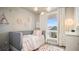 Charming bedroom with a cozy bed, soft lighting, and decorative floral accents at 20 Wilcox St # 302, Castle Rock, CO 80104