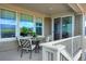 Outdoor deck with table and chairs at 1055 Snowberry Ave, Elizabeth, CO 80107