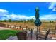 Relaxing outdoor patio area with comfortable seating, offering tranquil views of the natural landscape at 1055 Snowberry Ave, Elizabeth, CO 80107