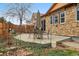 Backyard with patio area, outdoor seating, and a charming swing at 2958 S Lisbon Way, Aurora, CO 80013