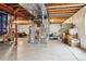 Unfinished basement with utilities, offering potential for customization at 2958 S Lisbon Way, Aurora, CO 80013