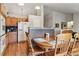 Bright kitchen with wood cabinets, granite countertops, and stainless refrigerator at 2958 S Lisbon Way, Aurora, CO 80013