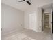 Neutral bedroom with plush carpet, a ceiling fan, and a closet at 6444 Silver Mesa Dr # A, Highlands Ranch, CO 80130