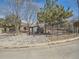 Community pool surrounded by pine trees and landscaping at 6444 Silver Mesa Dr # A, Highlands Ranch, CO 80130