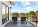 Relax on the private balcony with mountain views, perfect for outdoor seating and enjoyment at 9052 Harlan St, Westminster, CO 80031