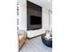 Modern living room with sleek entertainment center and stylish decor at 9052 Harlan St, Westminster, CO 80031