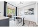 Bright office space with natural light, modern fixtures, and a walkout balcony at 9052 Harlan St, Westminster, CO 80031