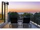 Rooftop deck with seating to enjoy the sunset over mountain views at 9052 Harlan St, Westminster, CO 80031