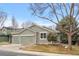 Charming single-story home features manicured front yard and two-car attached garage at 1668 Holeman Dr, Erie, CO 80516