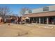 Commercial building featuring Fox Dog Coffee with outdoor patio and parking spots at 1668 Holeman Dr, Erie, CO 80516