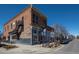 Historic brick building with renovated storefronts, offering a unique commercial location with street visibility at 1668 Holeman Dr, Erie, CO 80516