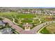 Aerial view of a neighborhood park with playground, gazebo, and open green space at 15033 Delhi Ave, Parker, CO 80134
