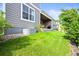 Lush backyard with a patio and green lawn at 15033 Delhi Ave, Parker, CO 80134
