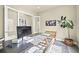 Modern office space with large glass doors, contemporary desk, and stylish decor, creating a productive atmosphere at 15033 Delhi Ave, Parker, CO 80134