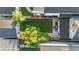 Aerial view of a well-maintained backyard featuring lawn, garden, and outdoor seating at 1832 W 36Th Ave, Denver, CO 80211