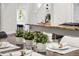 Formal dining area showcasing a table setting, adjacent to the kitchen and staircase at 1832 W 36Th Ave, Denver, CO 80211