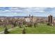 Scenic aerial view of the city skyline featuring parks, trees, and residences, harmonizing urban and natural elements at 1200 N Humboldt St # 1204, Denver, CO 80218